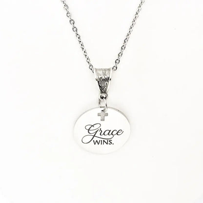 Grace Wins Stainless Steel Engraved Pendant Necklace With Cross Cutout By JKCE Designs - Necklaces