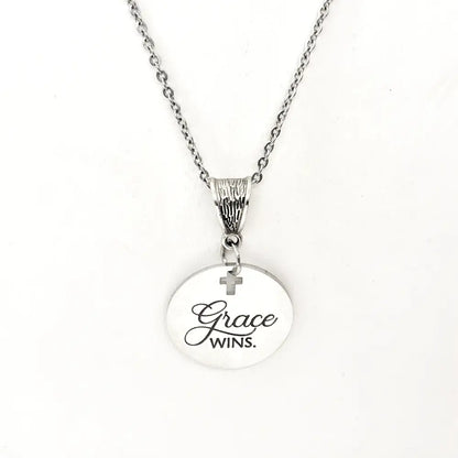 Grace Wins Stainless Steel Engraved Pendant Necklace With Cross Cutout By JKCE Designs - Necklaces