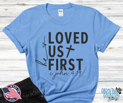 He Loved Us First – Multi Small / Blue Shirt