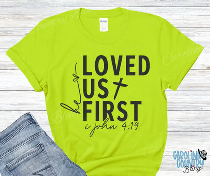 He Loved Us First – Multi Small / Green Shirt