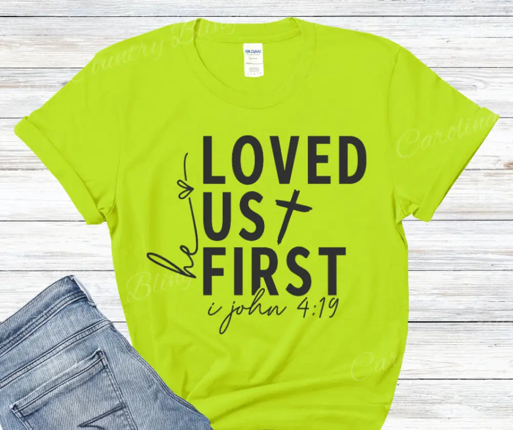 He Loved Us First – Multi Small / Green Shirt
